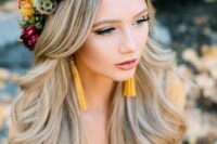 a bright flower crown for a boho fall wedding, with deep purple, yellow and blush blooms is a fantastic and contrasting solution