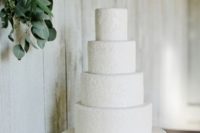 a large purely white lace wedding cake is a gorgeous idea with much style and elegance that inspires