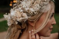 a neutral dried flower crown with leaves, blooms and berries, with silk leaves is a lovely idea for a neutral boho bride