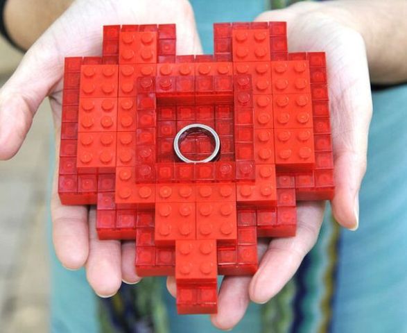a red Lego heart instead of a usual wedding ring dish will give a special touch to your wedding