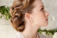 a retro wedding updo with fixed waves and curls on long hair is a very cool idea for a 1940s or 1950s wedding