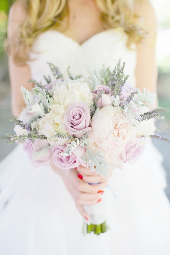 a sweet pastel bouquet of white and dusty pink roses and some herbs looks cool and very romantic