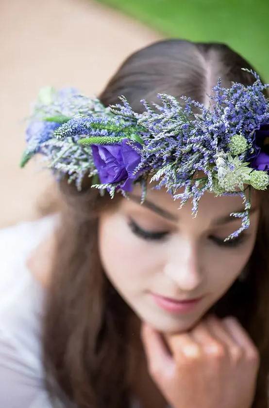 a textural purple flower crown with a bit of greenery is a bold and catchy idea for a summer bride, it will add color to the look
