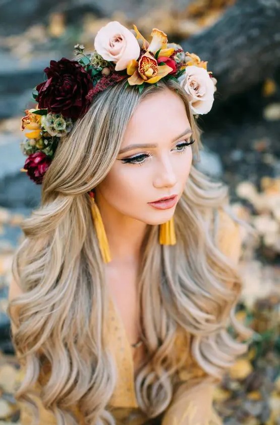 an exquisite fall floral crown with mustard, blush and burgundy blooms, greenery and seed pods is a very chic idea
