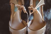cute refined rose gold glitter wedding shoes with gold edges and bows are amazing for a glam bridal look