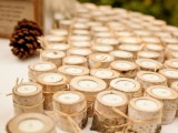 lovely wedding candles in tree branches