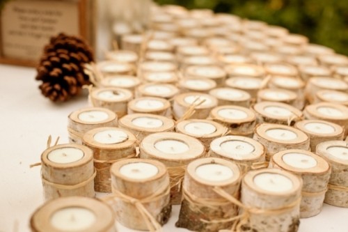 tree branch candleholders with candles inside will be nice wedding favors for a rustic wedding