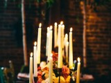 beautiful wedding table decor with blooms and candles in metal candleholders is a lovely idea for a wedding