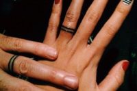 Simple and stylish wedding ring tattoos made of just two lines on your finger