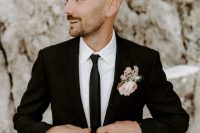 a lovely neutral groom’s look with a skinny tie