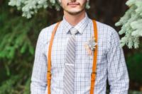 a creative look with a windowpane shirt, a striped tie, brown pants and orange leather suspenders