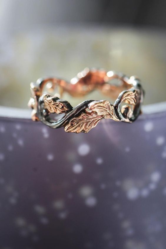a gold leafy wedding ring is a lovely solution for those who love gardens, plants or just want something very elvish