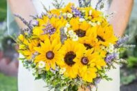 a laid-back rustic wedding bouquet of sunflowers, lavender, daisies and greenery plus evergreens is easy to make yourself