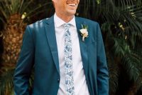 a lovely tropical groom’s look with a skinny tie