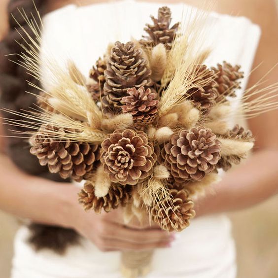 a pinecone and wheat wedding bouquet is ideal for a rustic bride, it's very cozy and cool