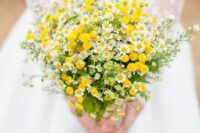 a simple summer wedding bouquet of billy balls and chamomiles can be easily DIYed