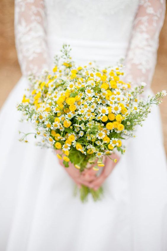 a simple summer wedding bouquet of billy balls and chamomiles can be easily DIYed