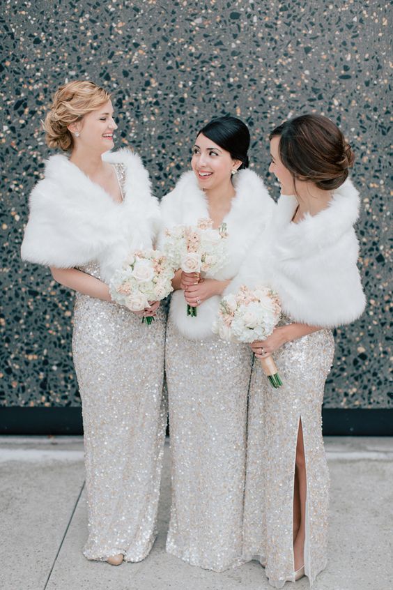 silver sequin maxi bridesmaid dresses with side slits, nude shoes and faux fur wraps for winter bridesmaids