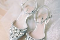 silver wedding shoes with large rhinestones are amazing for a sparkly and glam bridal look