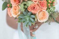 a bright coral and mint wedding bouquet with greenery and succulents is ideal for a bride