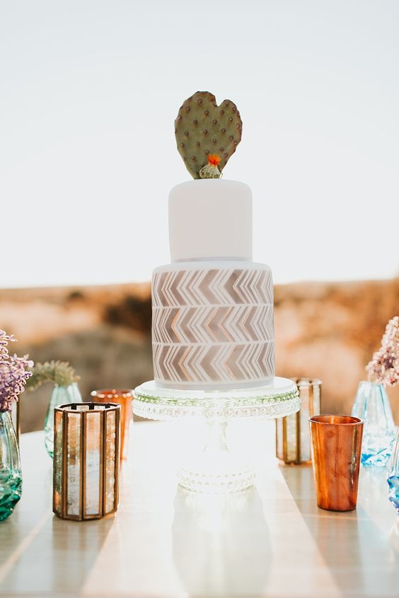 a chic desert wedding cake with a white and grey chevron tier, with a real cactus on top is a lovely idea for a mid-century modern or boho wedding
