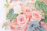 a chic wedding bouquet with mint leaves and succulents, coral and creamy blooms for a bride