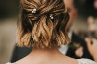 a lovely half updo on shirt hair, with some twists and pretty pearl hairpins is a very cool and delicate idea
