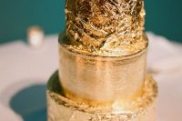 a super glam textural gold leaf wedding cake will sparkle all over and impress with its look and taste