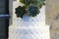 a white chevron wedding cake decorated with succulents is a lovely and stylish idea for a mid-century modern wedding