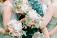mismatching mint bridesmaid dresses, coral, white and mint bouquets for all the gals