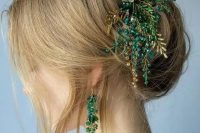 a cool updo with some mess and texture, with locks down and a jaw-dropping gold and emerald hairpiece is wow