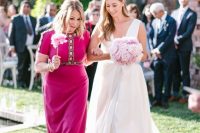 a fuchsia-colored maxi dress with embellishments and embroidery is a stunning idea for a summer wedding