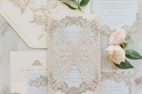 a jaw-dropping tan and gold wedding invitation suite done with lace invites and an envelope is a fantastic idea that stands out