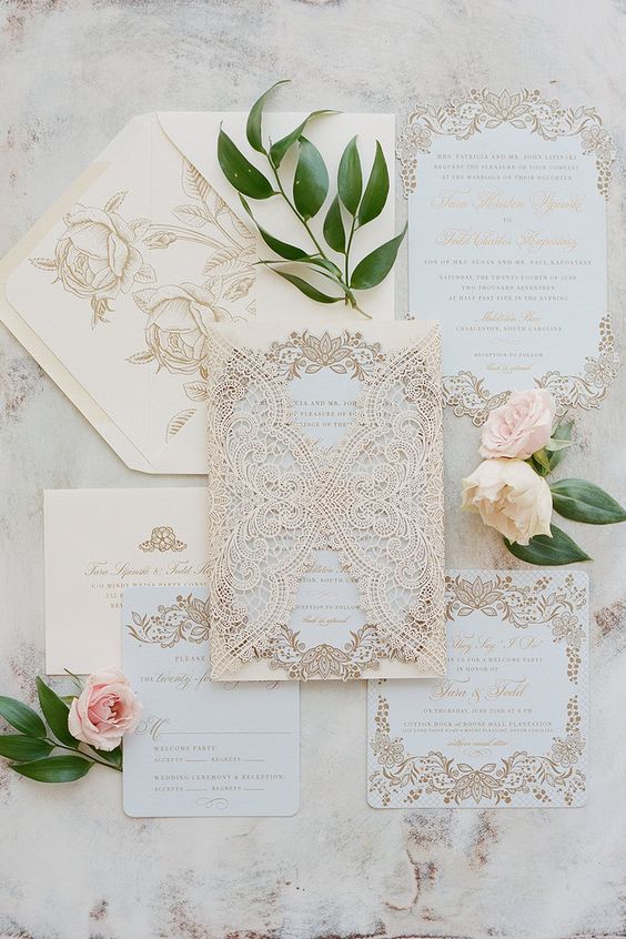 a jaw-dropping tan and gold wedding invitation suite done with lace invites and an envelope is a fantastic idea that stands out