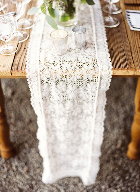 a lace table runner is a cool solution for many weddings - vintage, boho, rustic and many others, get one