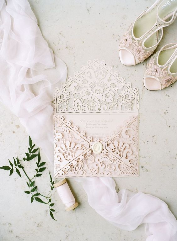 a refined pink lace wedding invitation envelope is a gorgeous idea for an exquisite and chic wedding in pastels
