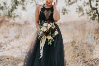 a sleeveless halter neckline wedding dress with an illusion bodice and a layered tulle skirt is a fantastic idea for a sexy witchy wedding look