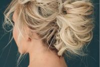 a super messy wedding updo for medium hair with no accessories is a lovely idea for a destination bride who doesn’t want to puzzle over her hair