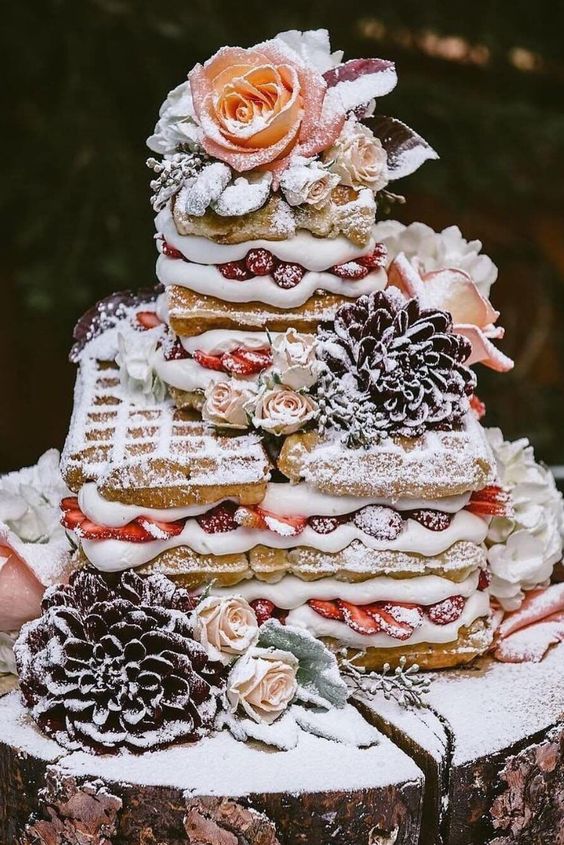 a waffle wedding cake with fresh berries and fresh blooms on top is ideal for a brunch wedding
