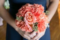 an awesome coral wedding bouquet