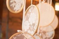lace embroidery hoops hanging over the space will give a slight vintage feel to it and will make it more beautiful, and DIYing them is easy