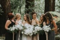 mismatched black, tan, grey bridesmaid dresses with and without embellishments for a woodland wedding