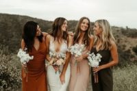 mismatched fall-colored and blush bridesmaid dresses and tan shoes for a chic fall wedding