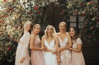 mismatched neutral and blush bridesmaid dresses with lace appliques for a romantic modern wedding