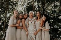 mismatched off white maxi bridesmaid dresses will help your gals avoid overheatign thanks to the color