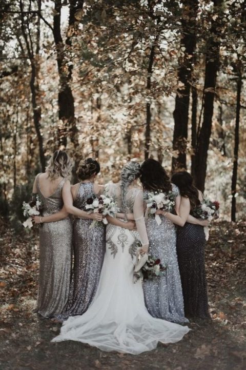 mismatched silver sequin sheath bridesmaid dresses and a black embellished gown for the maid of honor