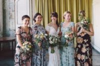 mismatching floral maxi bridesmaid dresses in various colors for a summer wedding