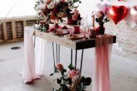 pink, red and gold decor for a Valentine’s Day wedding is super cute, fun and whimsy