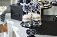 wedding trifles with black and white clock toppers look cool, bright and fun for a NYE wedding