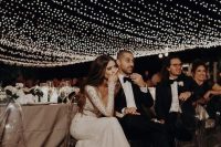 a glam light canopy over the whole reception is a gorgeous idea to make your venue very special